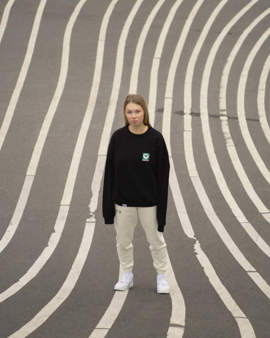 Female Model with BECT We Are Together Sweater at Superkilen in Copenhagen, Denmark